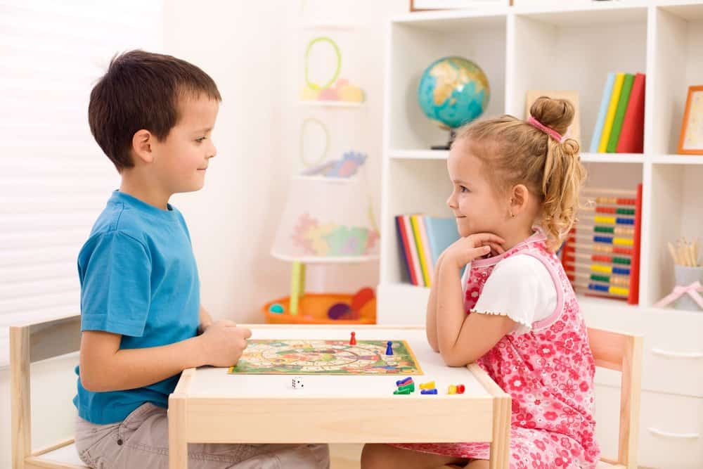 Preschoolers playing board games