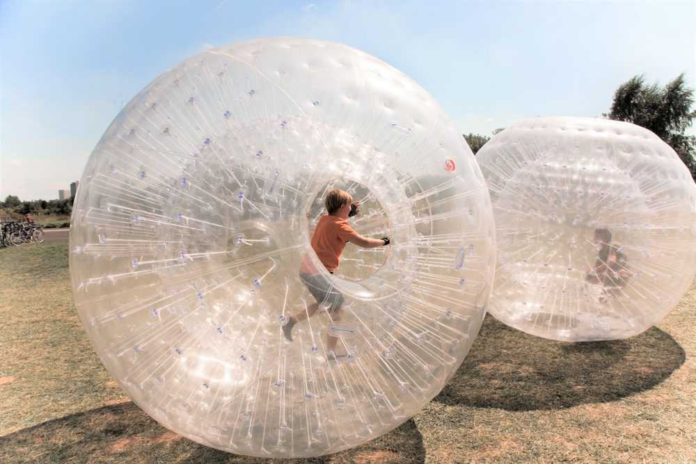 Kids playing with inflatable bumper balls