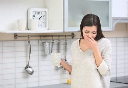 Pregnant woman feeling sick and nausea