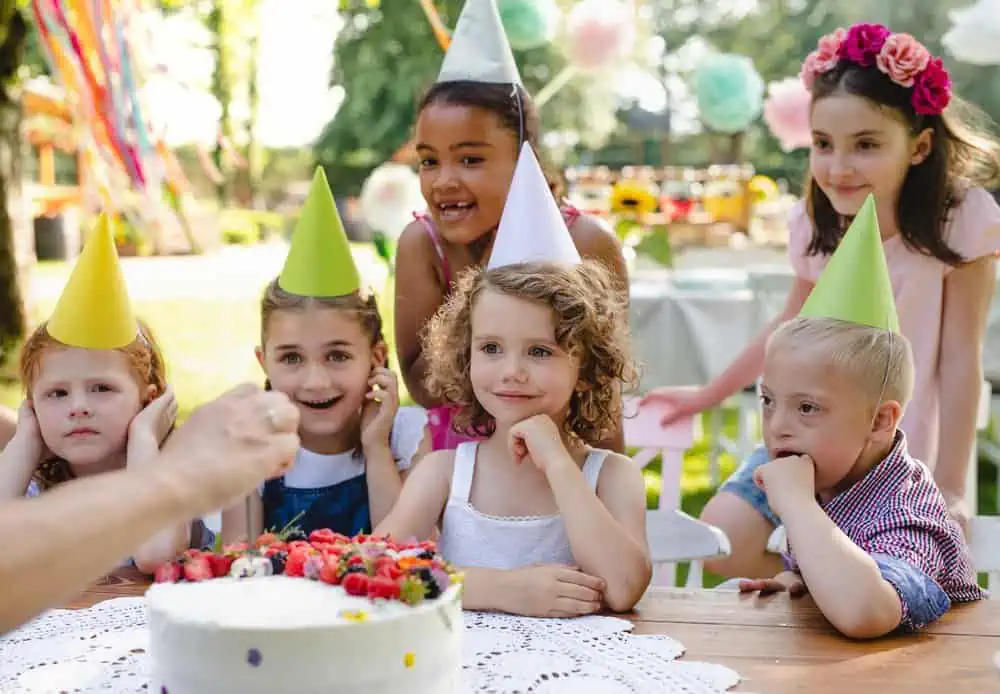 Happy kids celebrating 6th birthday.