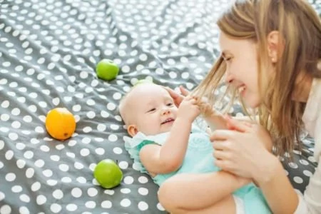 Baby pulling mom's hair