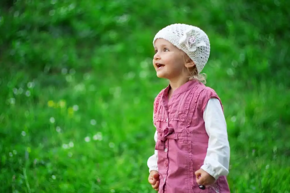 Cute little girl having fun in the park