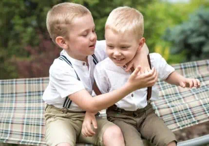 Two happy Polish boys playing in the park