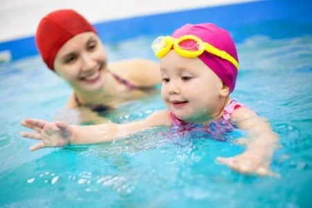 Baby learning how to swim